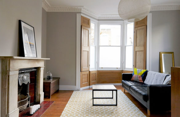 House of Sylphina interior design, Stoke Newington. Grey living room with wooden detail.