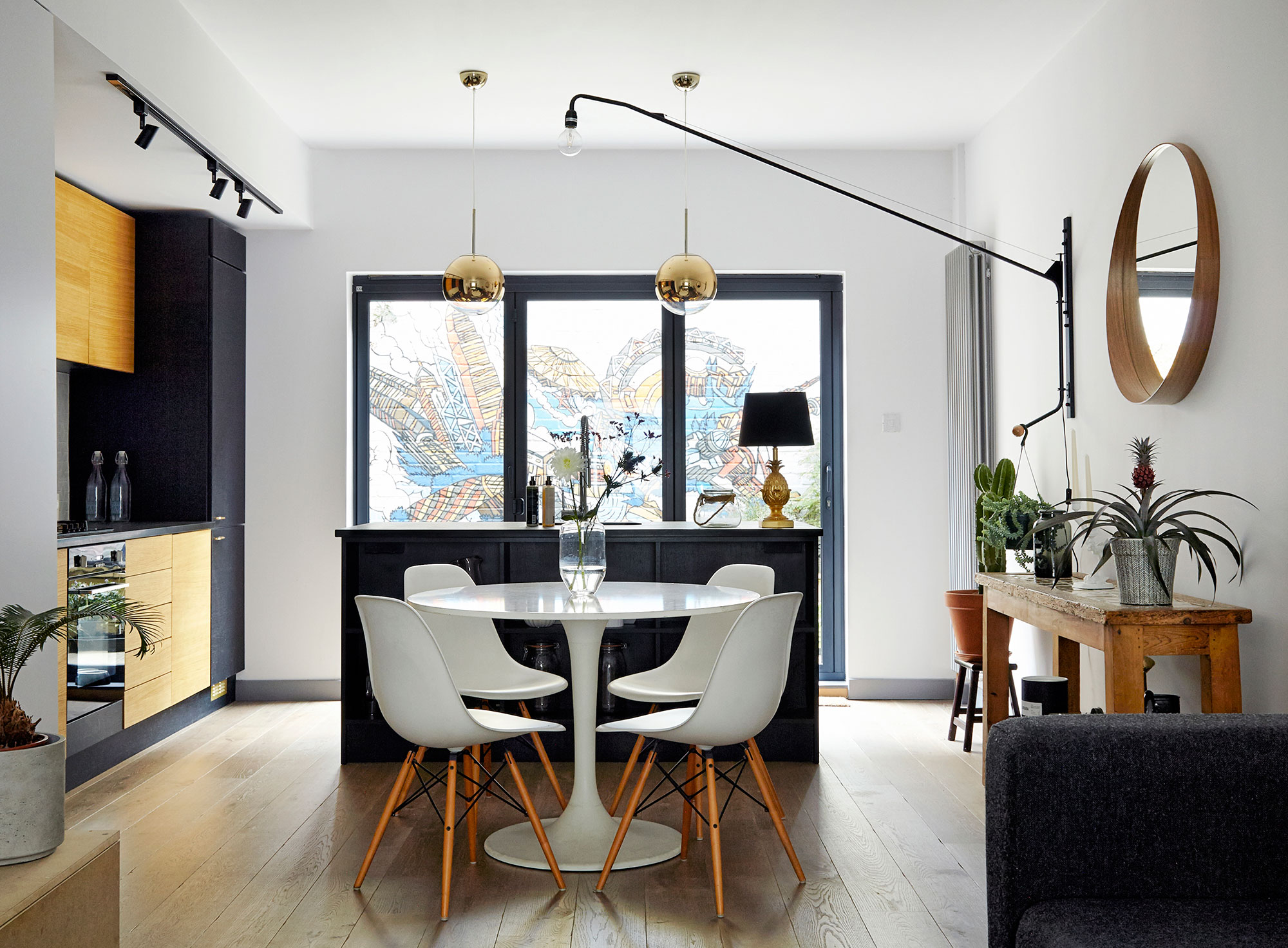 House of Sylphina interior design, Dalston. Monochrome kitchen dining room with gold accents